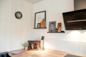 Μια τηλεόραση ή/και κέντρο ψυχαγωγίας στο Ferienwohnung Kleine Auszeit