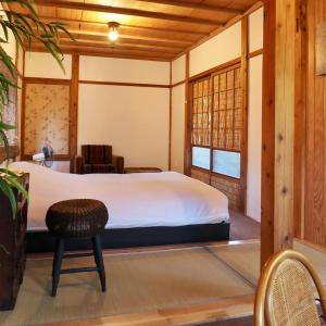 Ένα ή περισσότερα κρεβάτια σε δωμάτιο στο つなぎ