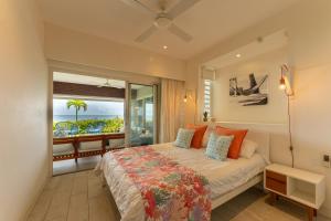 Ένα ή περισσότερα κρεβάτια σε δωμάτιο στο Lagoon view apartment right on beach +39 φωτογραφίες