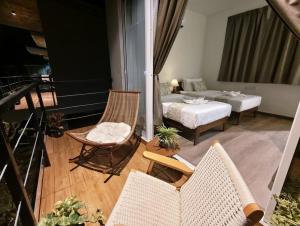 Postel nebo postele na pokoji v ubytování Borneo Nature Lodge 2