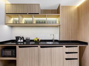 Kuchyň nebo kuchyňský kout v ubytování Novotel Rayong Star Convention Centre