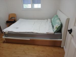 Postel nebo postele na pokoji v ubytování Park Vill 202