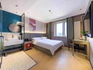 Postel nebo postele na pokoji v ubytování Li Hao Hotel Beijing Capital Airport and Exhibition Center