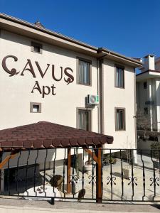 a sign on the side of a building at Daily-Weekly-Monthly in Kötekli Center  +1 photo