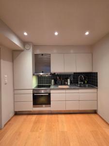 Η κουζίνα ή μικρή κουζίνα στο byNORD City Apartment - Vestregata 36b