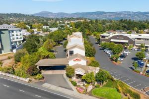 an aerial view of a town with a building at Hawthorn Suites by Wyndham Napa Valley in Napa