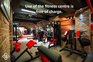 a gym with fitness equipment and a quote use of the fitness centre is free at Diplomat Suites Hotel in Baku