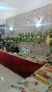 a buffet line with many different types of food at Hotel seven park in Nevsehir