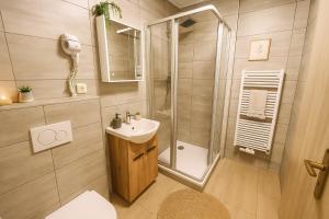 Ένα μπάνιο στο New Apartment for relax Brandýs u Prahy