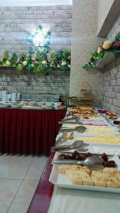 a buffet line with plates of food on display at Hotel seven park in Nevsehir