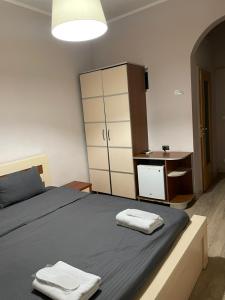 Voodi või voodid majutusasutuse Taste Tbilisi toas