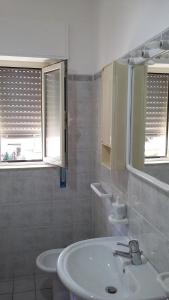 Koupelna v ubytování La Casa sul Corso