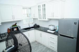 Η κουζίνα ή μικρή κουζίνα στο White Villa