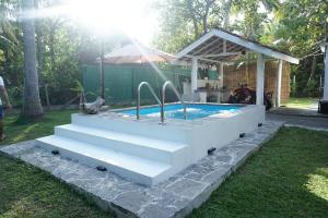 Πισίνα στο ή κοντά στο White Villa