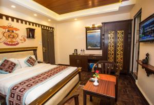 Kama o mga kama sa kuwarto sa Hotel Encounter Nepal & Spa