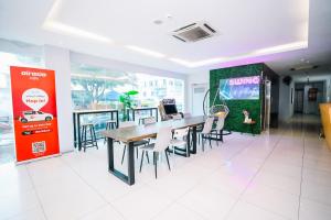 Μια τηλεόραση ή/και κέντρο ψυχαγωγίας στο Swing & Pillows - KL Sg Besi, Kuala Lumpur