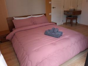 Postel nebo postele na pokoji v ubytování Goldena Residence Pool Villas