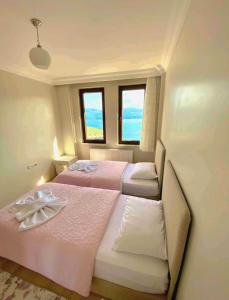 Postel nebo postele na pokoji v ubytování Amasra Doğa Apart