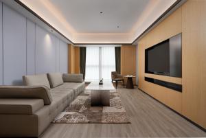 TV a/nebo společenská místnost v ubytování Wanda Moments Neo, Shijiazhuang Chang'an