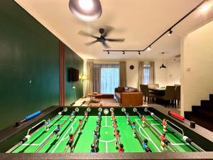 Herní místnost v ubytování BNB Cozy Homestay - Cyberjaya, 14 pax