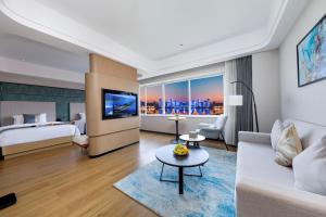 TV a/nebo společenská místnost v ubytování Changsha Huaxin Hotel