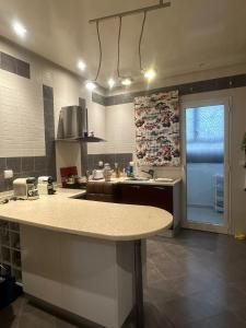 Kuchyň nebo kuchyňský kout v ubytování Vacances de rêve