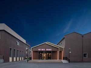 a building with a fire minute sign on it at Orange Hotel Beijing Zhongguancun Software Park in Beijing