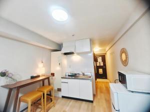 Η κουζίνα ή μικρή κουζίνα στο Sidihome 365 Apartment