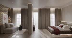 a bedroom with a bed and a chair and windows at HAITA Suites in Ho Chi Minh City