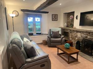 Istumisnurk majutusasutuses The Old Farmhouse at Brackenthwaite Farm