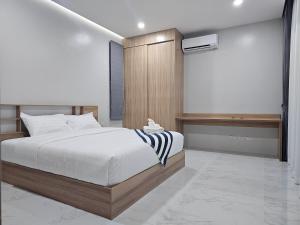 Ένα ή περισσότερα κρεβάτια σε δωμάτιο στο Lua Villa +15 φωτογραφίες