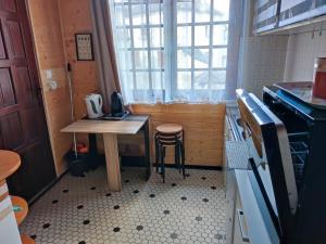 Kuchyň nebo kuchyňský kout v ubytování Montée du Boiloa - Bielle, Laruns + 10 fotografií