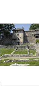 an old building with steps in front of it at Rivellino Guesthouse app 2 in Locarno