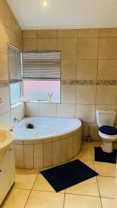 Koupelna v ubytování Peshi's Guest House + 28 fotografií