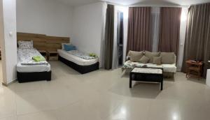 En eller flere senge i et værelse på Casa De Zambini