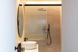 Vannituba majutusasutuses Lamezia Living