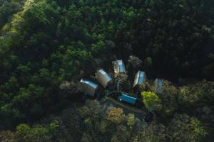 an aerial view of a house in a forest at SANU 2nd Home 那須2nd in Nasu