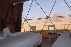 Postel nebo postele na pokoji v ubytování Wadi Rum Adventures + 8 fotografií