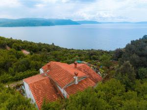an aerial view of a house with an orange roof at Villa Paradiso in Plomin - Istrien in Plomin +54 photos