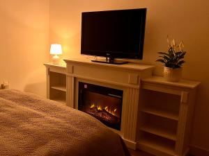 Et tv og/eller underholdning på La Casita del Escorial - Nueva Reforma + 26 billeder