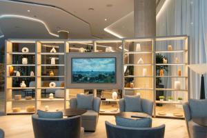 TV a/nebo společenská místnost v ubytování Marriott Corrientes