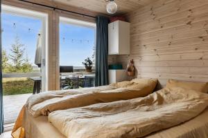 Postel nebo postele na pokoji v ubytování Family Cabin With Views Over Hadeland