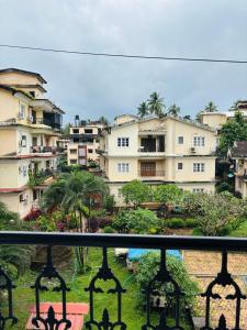 a view of a city from a balcony at 1bhk in Calangute North Goa nearby beach Sea Breeze Bay in Calangute