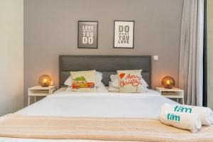 Ένα ή περισσότερα κρεβάτια σε δωμάτιο στο FAM Living City Walk - Opposite City Walk Mall - 2A +13 φωτογραφίες