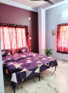 Ένα ή περισσότερα κρεβάτια σε δωμάτιο στο Grace Garden +6 φωτογραφίες