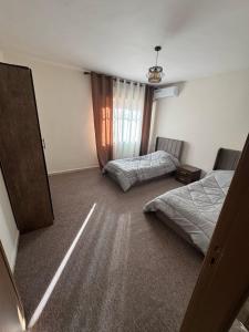 Postel nebo postele na pokoji v ubytování may-8