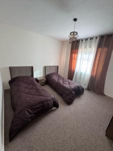 Postel nebo postele na pokoji v ubytování may-8