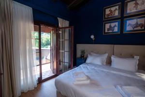 Postel nebo postele na pokoji v ubytování Deluxe Double Room by MANAGR + 34 fotografií