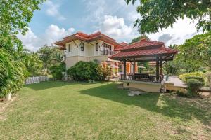 Κήπος έξω από το Laguna Village 4-BR Pool Villa by Stayisle