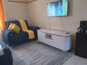 TV a/nebo společenská místnost v ubytování Flomark